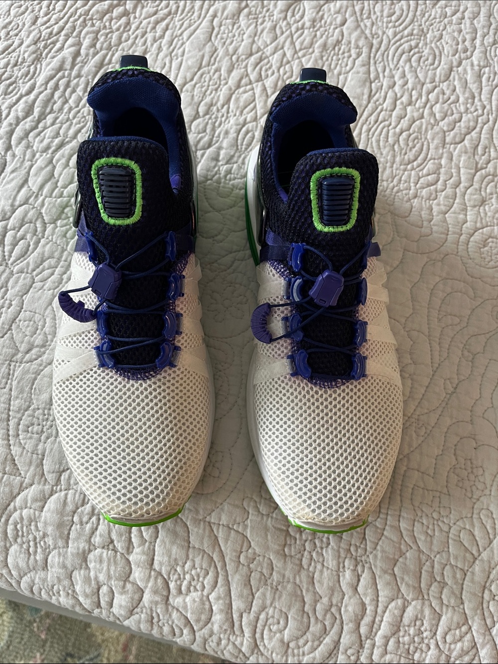 NIKE White Mesh Athletic Sneakers with Purlpe and Green Accents
